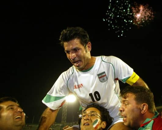 Former Asian player of the year and Iranian football legend Ali Daei has spoken in support of anti-government protests in Iran (Photo by Behrouz MEHRI / AFP)