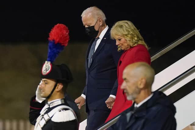 President Joe Biden and first lady Jill Biden arrive at Rome-Fiumicino International Airport to attend the G-20 leaders meeting, Friday, Oct. 29, 2021, in Rome. (AP Photo/Evan Vucci)