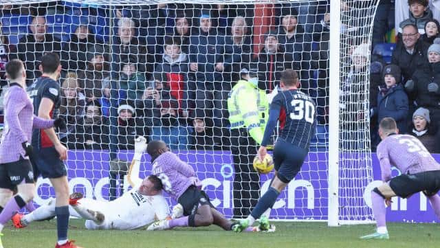 Matthew Wright pounces on a mix-up in the Rangers defence to score Ross County's stoppage time equaliser in the 3-3 draw in Dingwall. (Photo by Craig Williamson / SNS Group)