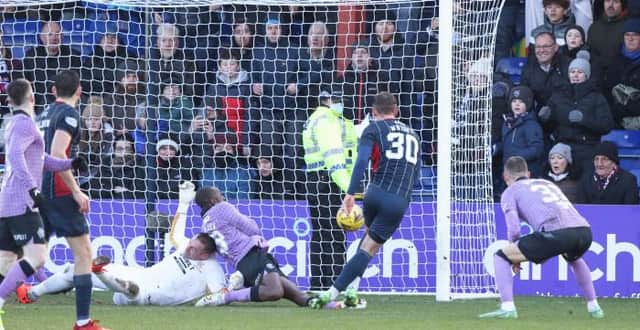Matthew Wright pounces on a mix-up in the Rangers defence to score Ross County's stoppage time equaliser in the 3-3 draw in Dingwall. (Photo by Craig Williamson / SNS Group)