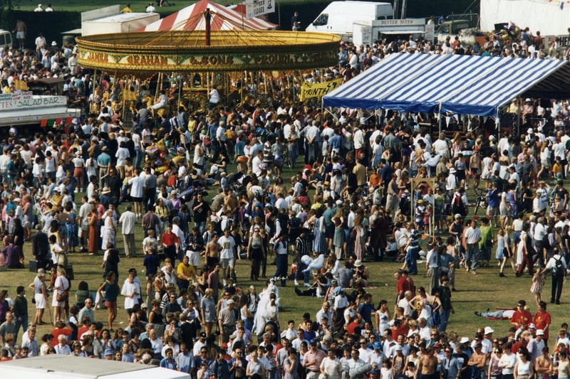 Crowds attend Fringe Sunday 1995 at Holyrood Park.