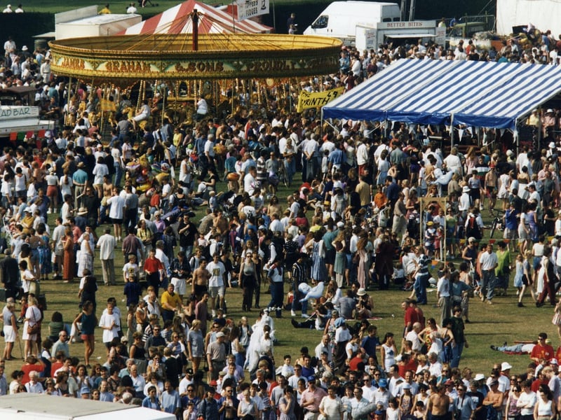 Crowds attend Fringe Sunday 1995 at Holyrood Park.