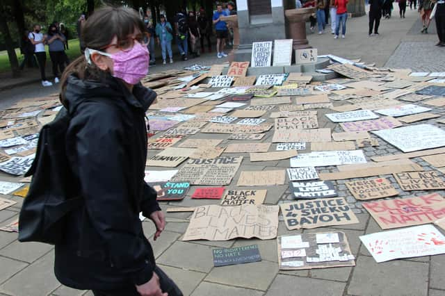 People take part in a Black Lives Matter protest rally in Glasgow Green