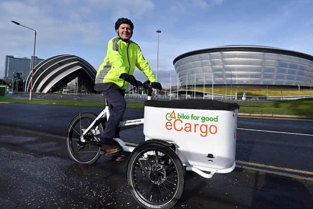 Alastair Dalton passing the Scottish Event Campus en route to The Scotsman's Glasgow office. Picture: John Devlin