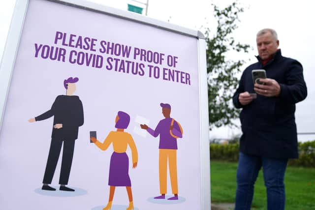 Signage informing spectators they need to show their vaccine passports to enter the ground before the UEFA Europa League Group G match at Celtic Park. Picture: PA