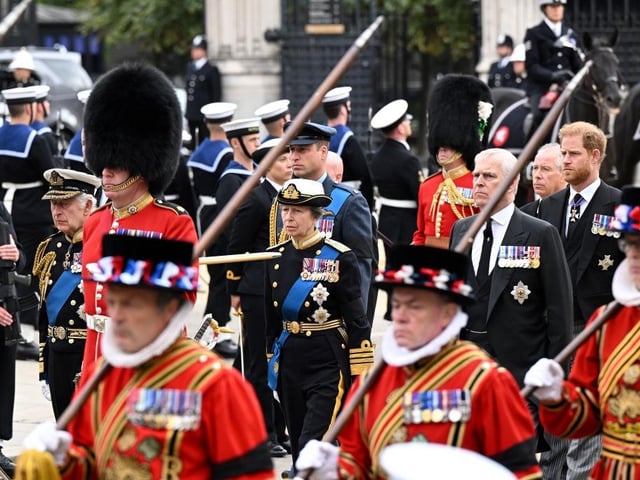 LONDON, ENGLAND - SEPTEMBER 19: King Charles III, Prince William, Prince of Wales, Anne, Princess Royal, Prince Andrew, Duke of York, and Prince Harry, Duke of Sussex, walk alongside Yeoman of the Guards at the State Funeral of Queen Elizabeth II on September 19, 2022 in London, England. Elizabeth Alexandra Mary Windsor was born in Bruton Street, Mayfair, London on 21 April 1926. She married Prince Philip in 1947 and ascended the throne of the United Kingdom and Commonwealth on 6 February 1952 after the death of her Father, King George VI. Queen Elizabeth II died at Balmoral Castle in Scotland on September 8, 2022, and is succeeded by her eldest son, King Charles III.  (Photo by Jeff Spicer/Getty Images)