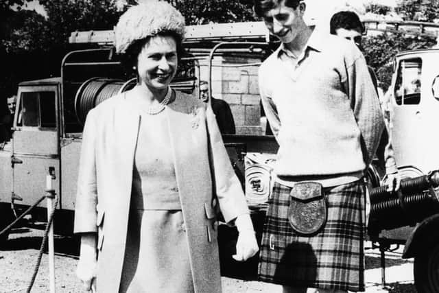 Queen Elizabeth II and Prince Charles, who is Head Boy here, pictured during a visit to Gordonstoun School, where she opened their new Sports Centre on July 24th 1967.