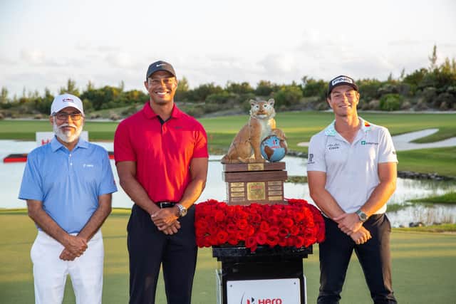 Dr Pawan Munjal, Chairman & CEO, Hero MotoCorp joined tournament host Tiger Woods to present the trophy to Viktor Hovland after his win in  Hero World Challenge, at the Albany resort in the Bahamas. Picture: Hero MotoCorp