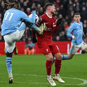 Liverpool wanted a penalty for this challenge by Man City's Jeremy Doku on Alexis Mac Allister.