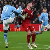Liverpool wanted a penalty for this challenge by Man City's Jeremy Doku on Alexis Mac Allister.