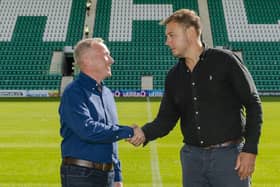 FC Edinburgh chairman Jim Brown and Hibs chief executive Ben Kensell shake on their new five-year partnership.