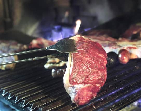 A good steak, with skinny fries and Béarnaise sauce is a meal to be savoured (Picture: Miguel Mendez/AFP via Getty Images)