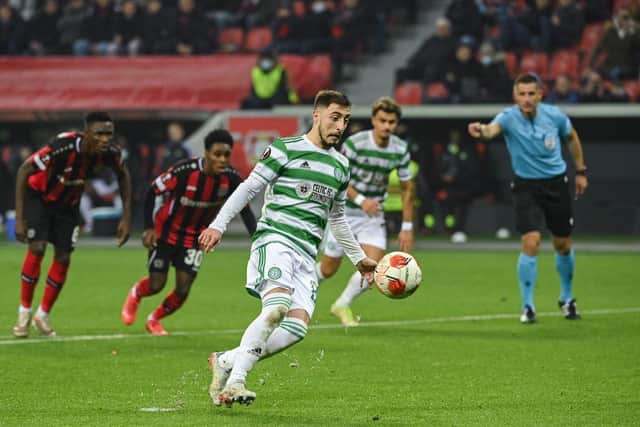 Croatian defender Josip Juranovic clips his Panenka-style penalty in off the crossbar against Bayer 04 Leverkusen. (Photo by INA FASSBENDER/AFP via Getty Images)