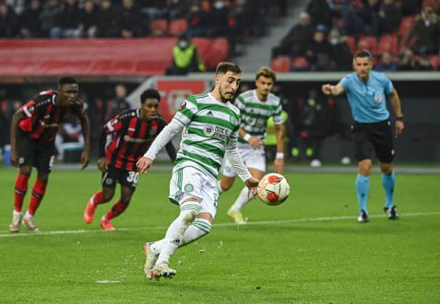 Croatian defender Josip Juranovic clips his Panenka-style penalty in off the crossbar against Bayer 04 Leverkusen. (Photo by INA FASSBENDER/AFP via Getty Images)