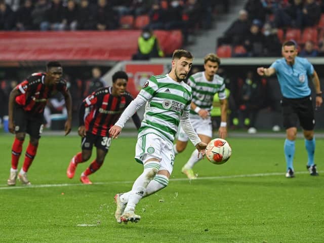 Croatian defender Josip Juranovic clips his Panenka-style penalty in off the crossbar against Bayer 04 Leverkusen. (Photo by INA FASSBENDER/AFP via Getty Images)