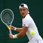 Ryan Peniston of Great Britain playing against Steve Johnson during the second round of men's singles at Wimbledon 2022 (Photo by Clive Brunskill/Getty Images)