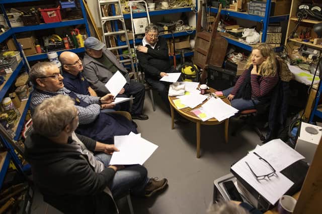 Clare Prenton listens in at a session of Peebles Men's Shed
