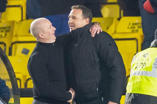 Livingston manager David Martindale and Ross County counterpart Malky Mackay shake hands after the 1-1 draw. (Photo by Roddy Scott / SNS Group)