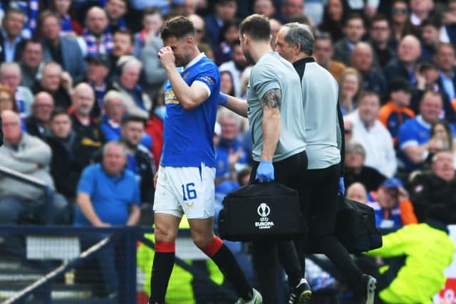 Rangers midfielder Aaron Ramsey goes off injured in the 43rd minute of the Scottish Cup semi-final against Celtic at Hampden Park. (Photo by Craig Foy / SNS Group)