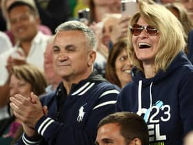 The parents of Serbia's Novak Djokovic, father Srdjan Djokovic (L) and mother Dijana Djokovic, react after he beats Russia's Andrey Rublev in the men's singles quarter-final match on day ten of the Australian Open tennis tournament in Melbourne on January 25, 2023. (Photo by DAVID GRAY/AFP via Getty Images)