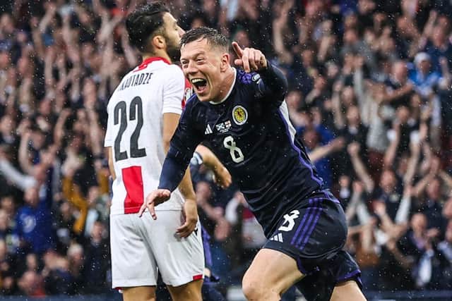 Scotland's Callum McGregor celebrates opening the scoring against Georgia before the match was delayed due to a waterlogged pitch. (Photo by Craig Williamson / SNS Group)