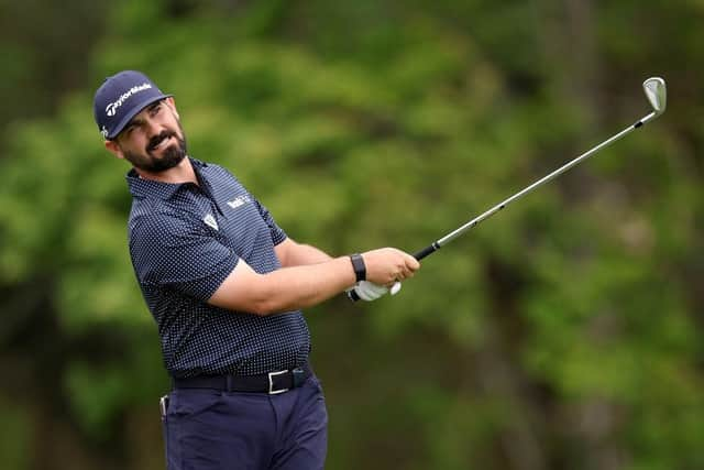 Chad Ramey watches his second shot on the 14th hole en route to carding an eight-under-par 64 in the first round at TPC Sawgrass. Picture: Richard Heathcote/Getty Images.