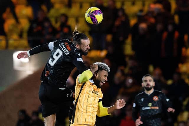 Dundee United's Steven Fletcher is a constant threat in the air. (Photo by Sammy Turner / SNS Group)