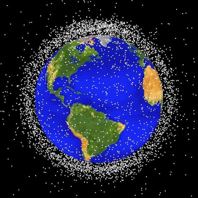 Intelligent aliens observing Earth may conclude its inhabitants are unconcerned about trashing their environment, given the amount of space junk in orbit (Picture: Nasa/Getty Images)