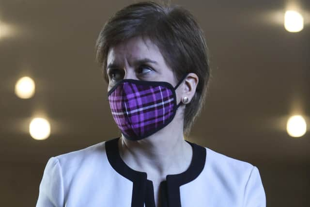 First Minister Nicola Sturgeon arrives for First Minister's Questions at the Scottish Parliament in Holyrood, Edinburgh. Picture: PA