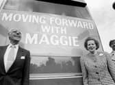 Margaret Thatcher, pictured with her election campaign bus and her husband Denis, during the 1987 general election campaign (Picture: PA)
