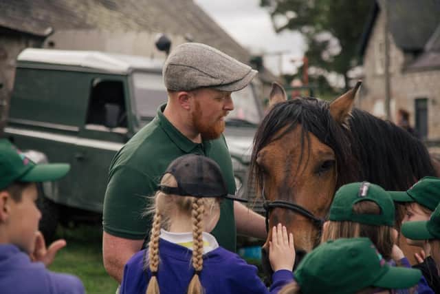 Gamekeeper Finlay Shand introducing hill pony Ezra to pupils learning about rural estates during Estates that Educate open day (pic: Kirk Norbury)