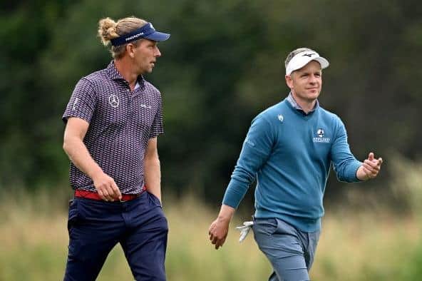 Home player Marcel Siem talks with European Ryder Cup captain Luke Donald during the BMW International Open after being put in same group at Golfclub Munchen Eichenried. Picture: Stuart Franklin/Getty Images.