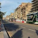 Buses run along Princes Street in Edinburgh as it reopens following a fire at the old Debenhams store building in early July (Picture: Neil Pooran/PA Wire)