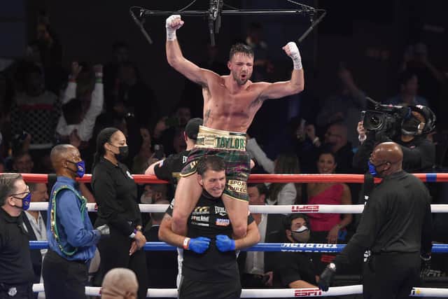 Josh Taylor is hoisted on to the shoulders of long-time coach Terry McCormack after his win by unanimous decision over Jose Ramirez. Picture: David Becker/Getty Images