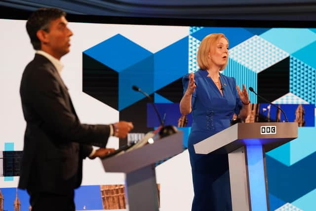 Rishi Sunak and Liz Truss taking part in the BBC Tory leadership debate live. Our Next Prime Minister, presented by Sophie Raworth, a head-to-head debate at Victoria Hall in Hanley, Stoke-on-Trent, between the Conservative party leadership candidates. Picture date: Monday July 25, 2022.