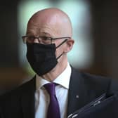 John Swinney has said the government will take a "canny approach" to releasing lockdown.