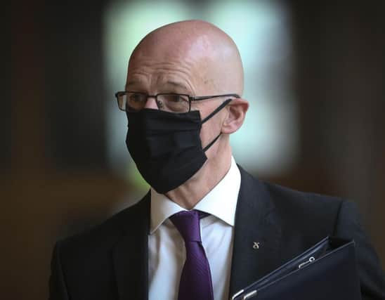 John Swinney has said the government will take a "canny approach" to releasing lockdown.