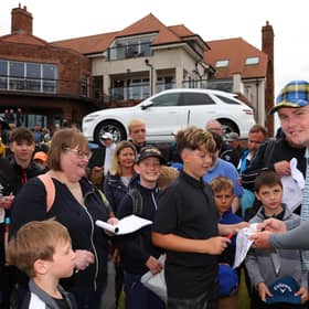 Bob MacIntyre autographs for young fans during the Genesis Scottish Open Pro-Am at The Renaissance Club. Picture: Andrew Redington/Getty Images.