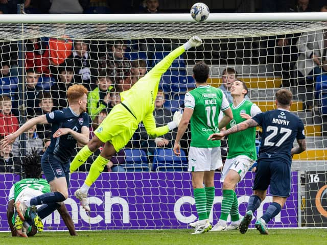 Ross County's Simon Murray (L) hits the bar during the 2-1 win over Hibs at the Global Energy Stadium. (Photo by Ross Parker / SNS Group)