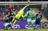Ross County's Simon Murray (L) hits the bar during the 2-1 win over Hibs at the Global Energy Stadium. (Photo by Ross Parker / SNS Group)