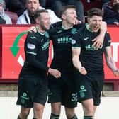 Hibs recorded a big win at Motherwell, with Kevin Nisbet scoring a hat-trick.