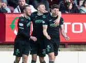 Hibs recorded a big win at Motherwell, with Kevin Nisbet scoring a hat-trick.