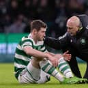 Celtic's Anthony Ralston was injured in the 2-1 win over Livingston.