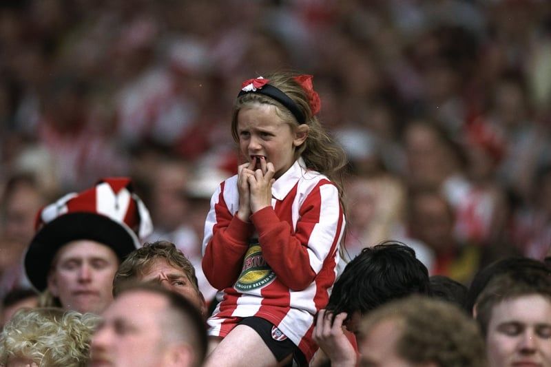 A young Sunderland fan watches the Nationwide League Division One play-off final against Charlton Athletic at Wembley Stadium in London. The match ended in a 4-4 draw after extra time and Charlton Athletic went on to win 7-6 on penalties.