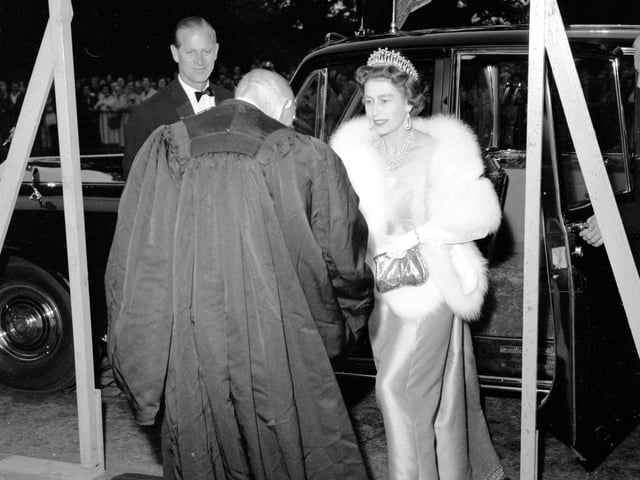 Queen Elizabeth II and Prince Philip arrive at the Royal College of Physicians, in Edinburgh, for a visit in 1966.