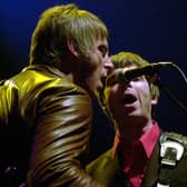 Paul Weller (left) and Noel Gallagher, seen performing in 2001, could still reform their respective bands, judging by the track record of other rock and roll stars (Picture: William Conran/PA)