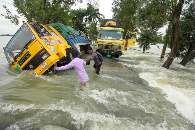 Floods in low-lying Bangladesh are getting worse as sea levels rise because of global warming (Picture: Mamun Hossain/AFP via Getty Images)