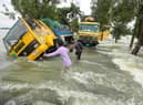 Floods in low-lying Bangladesh are getting worse as sea levels rise because of global warming (Picture: Mamun Hossain/AFP via Getty Images)