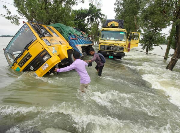 Floods in low-lying Bangladesh are getting worse as sea levels rise because of global warming (Picture: Mamun Hossain/AFP via Getty Images)