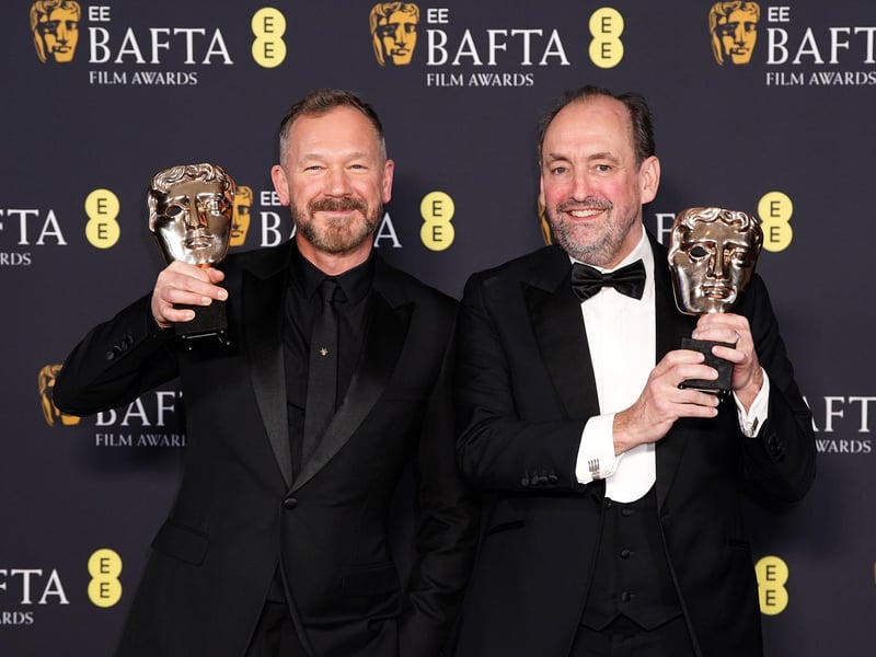Nathan Crowley and Lee Sandales in the press room after winning the Best Production Design award for Wicked during the 78th British Academy Film Awards
